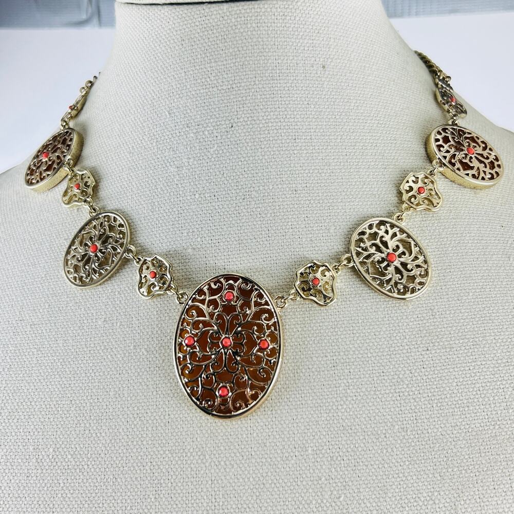 White House Black Market Gold Tone Filigree Statement Necklace Coral Medallion